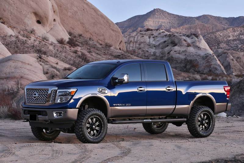 Fabtech 16-18 Nissan Titan Xd 4WD Diesel 6in Perf Sys w/Dl 2.5 Resi & 2.25